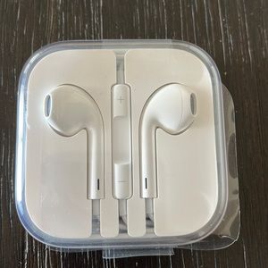 Brand new Apple ear buds with wrapper seal